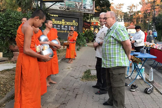 Alms and Wat Phra That Doi Suthep Private Chiang Mai Tour - Walking the local streets: small-city pace with a guide who knows what to point at