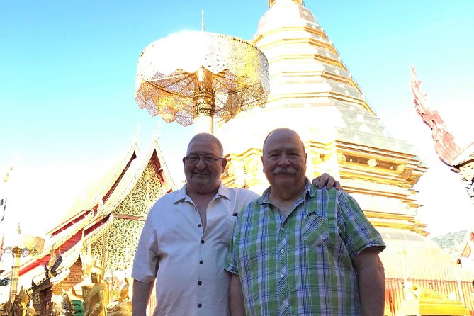 Alms and Wat Phra That Doi Suthep Private Chiang Mai Tour - Wat Phra That Doi Suthep: temple rules, cable car ticket, and the mountain payoff