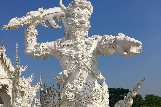 Chiang Mai-Chiang Rai:White+Black+Blue Temple+Golden Triangle+Boat Trip - Blue Temple (Wat Rong Seua Ten): color, craft, and a temple in progress