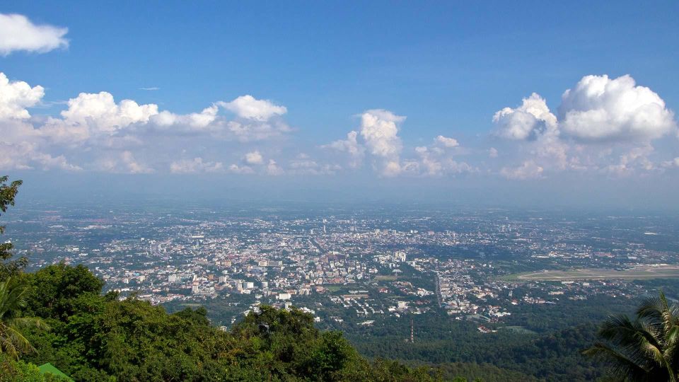 Chiang Mai: Doi Suthep and Hmong Village Half-Day Tour - Wat Phra That Doi Suthep: temple legends, steps, and big sky views