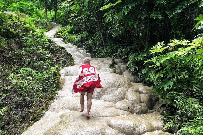 Chiang Mai Doi Suthep Temple and Sticky Waterfall Tour (Private & All-Inclusive) - Sticky waterfall time at Bua Thong (Nam Phu Chet Si): fun, wet, and physical