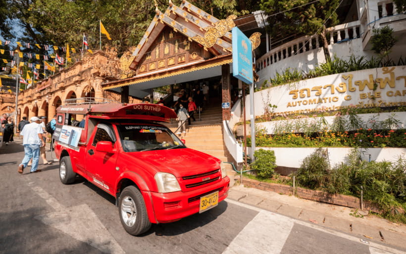 Chiang Mai: Doi Suthep Temple and Waterfall by Songtaew Trio - Wat Phra That Doi Suthep: The Mountain Road and the Holy Relic