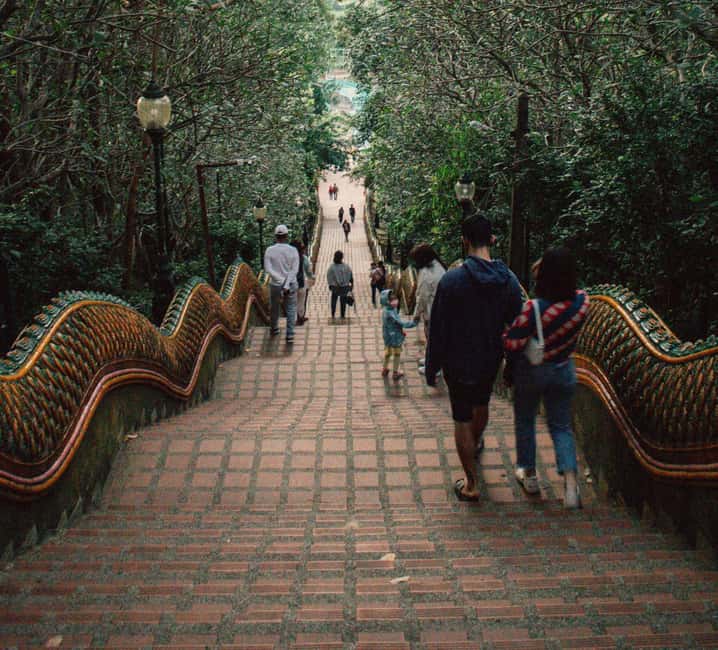 Chiang Mai: Doi Suthep Temple Guided Tour - Doi Suthep-Pui National Park Stop: Where the Surroundings Become Part of the Story