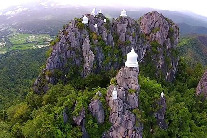 Chiang Mai Exotic Excursion Unseen Miracle of Faith To Pupadang Lampang Temple - Wat Phra Bat Pupha Daeng: prosperity prayers and the climb that matters