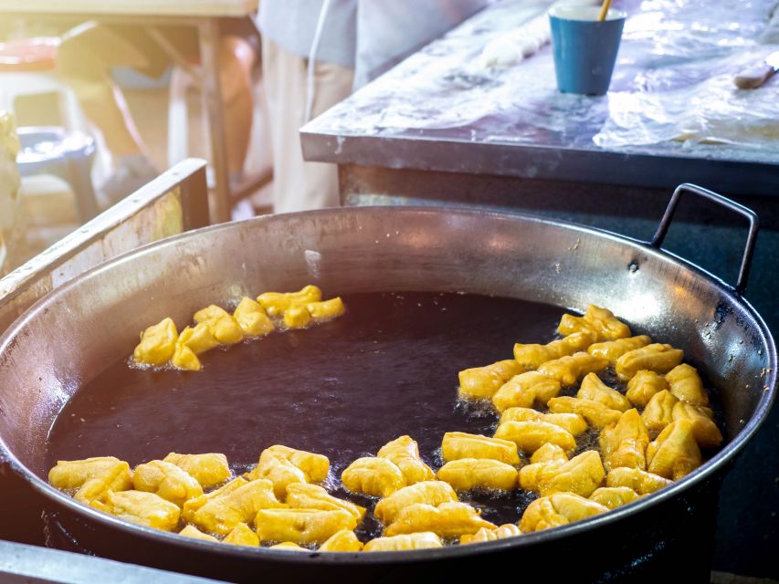 Chiang Mai: Local Food and Markets Guided Walking Tour - Go Neng and Pa Thong Ko: The Dino-Shaped Deep-Fried Snack
