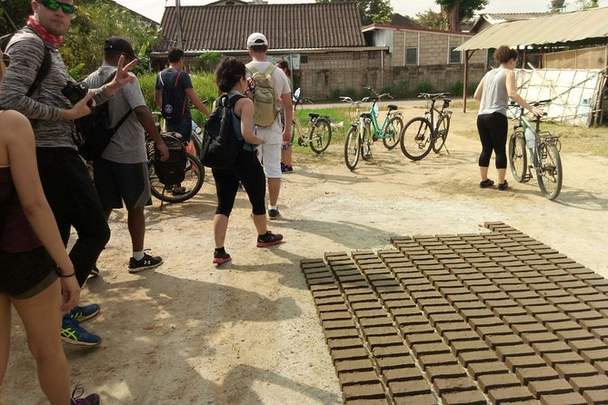 Chiang Mai Paradise Full-Day Cycling Adventure Tour - Baan Tawai: the quick craft village stop