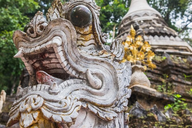 Chiang Mai Shared City Tour with Famous Temples - Wat Phra That Doi Suthep: the golden stupa and mountain views payoff