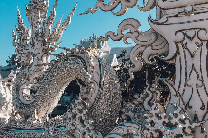 Chiang Rai Famed Temples and Golden Triangle Tour from Chiang Mai - Karen Long Neck Village: a short cultural stop with big sensitivities
