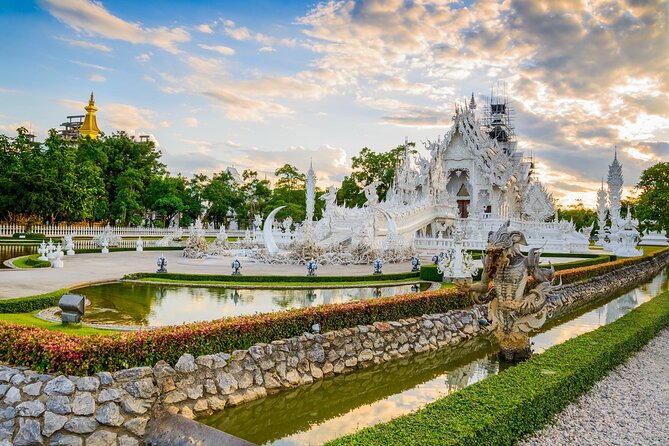 Chiang Rai White Temple, Blue Temple and more from Chiang Mai - Wat Huay Pla Kang (Red Temple complex): the 9-tier pagoda and the Guan Yin statue