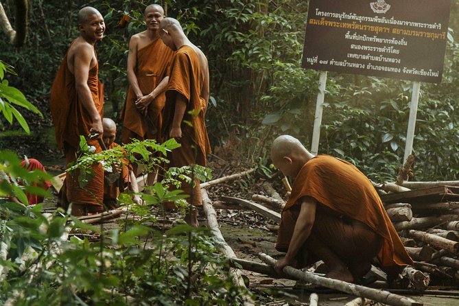 City Escape: Doi Inthanon & Karen Village Private Day Trip - Entering Doi Inthanon with a host who explains what you’re seeing