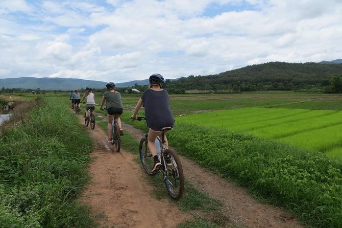 Cycling tour and Buatong waterfall - Wat Ban Den: temple time that fits the ride, not against it