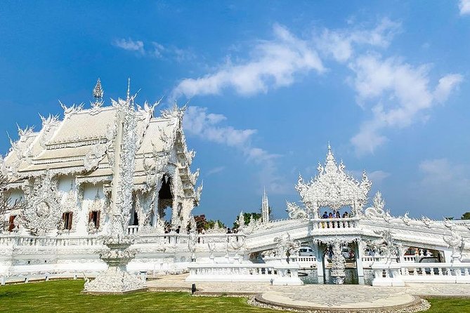 From Chiang Mai: White and Blue Temple & Golden Triangle Day Trip - Mekong River Boat Ride in Chiang Rai Province: A Break From Temples