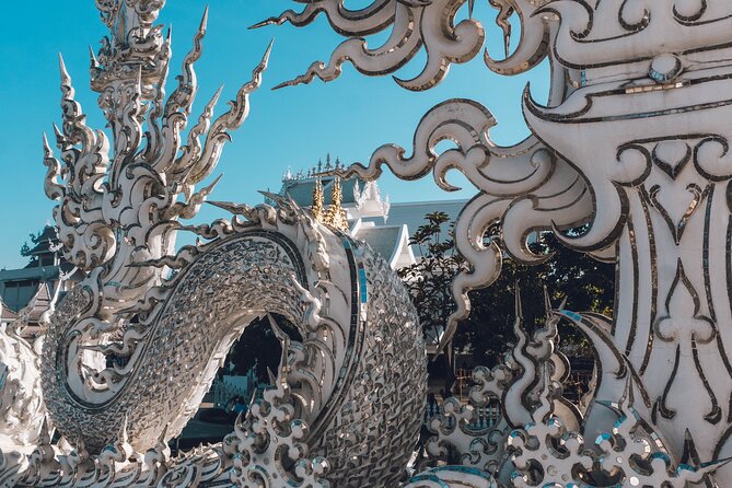 Full-Day Chiang Rai Temples Tour from Chiang Mai with Hot Spring - Wat Rong Khun White Temple: mirrors, symbols, and time well spent
