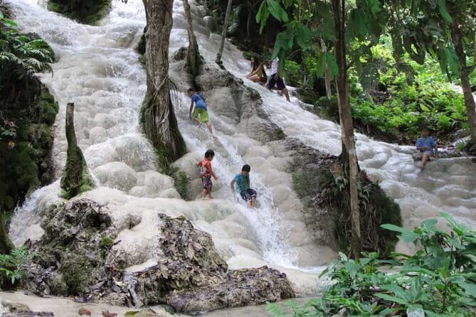 Full Day Elephant Bathing and Bamboo Rafting Tour in Chiang Mai - Bamboo rafting on the Taeng River: calm float to lively rapids