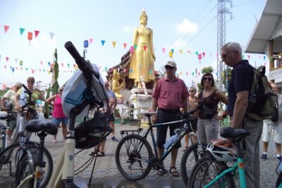 Half-Day Colors of Chiang Mai Biking Tour - Stop 2: Wat Pa Ngio, Big Buddha Statues, and Buddhism Basics