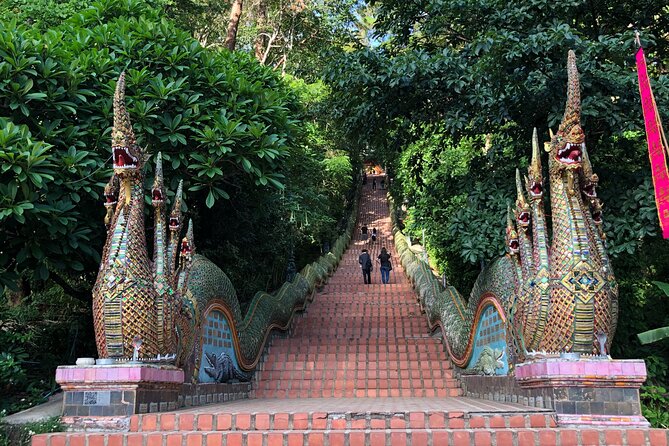 Half Day Doi Suthep Temple and Palad Temple (Private tour) - Wat Pha Lat: forest paths, a waterfall, and quieter temple grounds