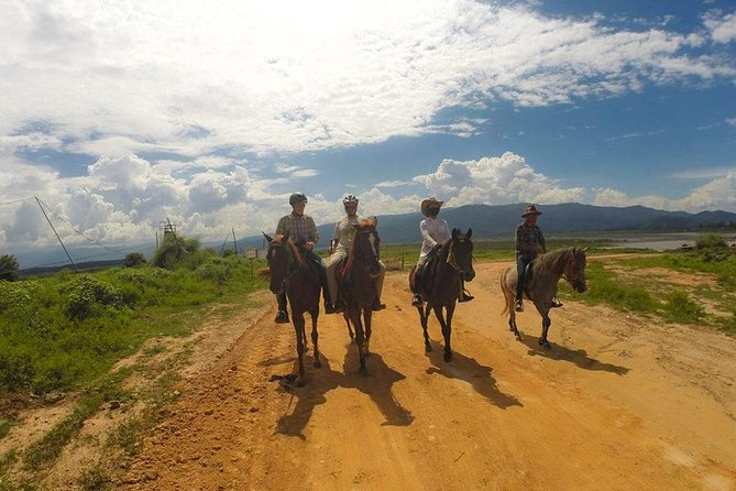 Horse Lesson+Riding+Wat Tonkwen wooden temple.Chiangmai - Wat Ton Kwen: carved wooden temple with a garden setting