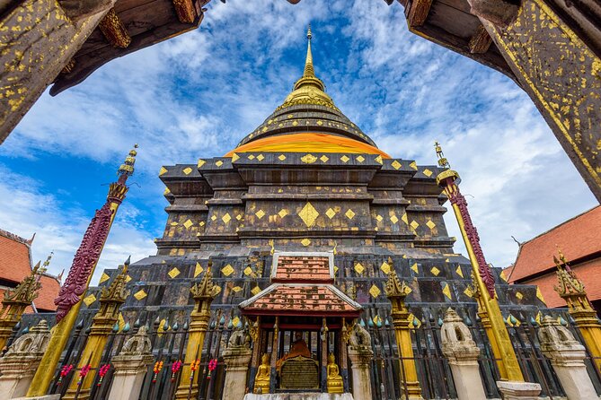 Lamphun and Lampang City Temples Small Group Tour – Full Day - The guide makes the temples click