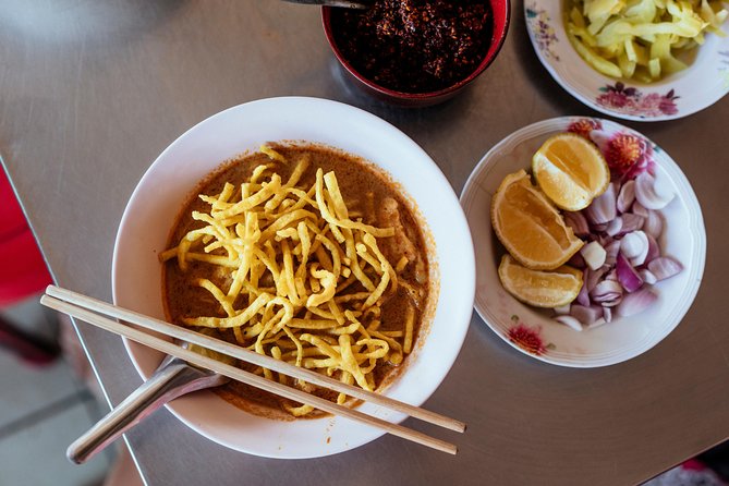 The 10 Tastings of Chiang Mai With Locals: Private Street Food Tour - Chang Phueak Monument: Thai Tea Orange Mystery and Sweetness Control