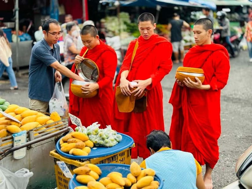 Walk With Monks Collecting Alms(meeting point maybe change) - Mueang Mai Market stop: seeing daily life inside a religious routine